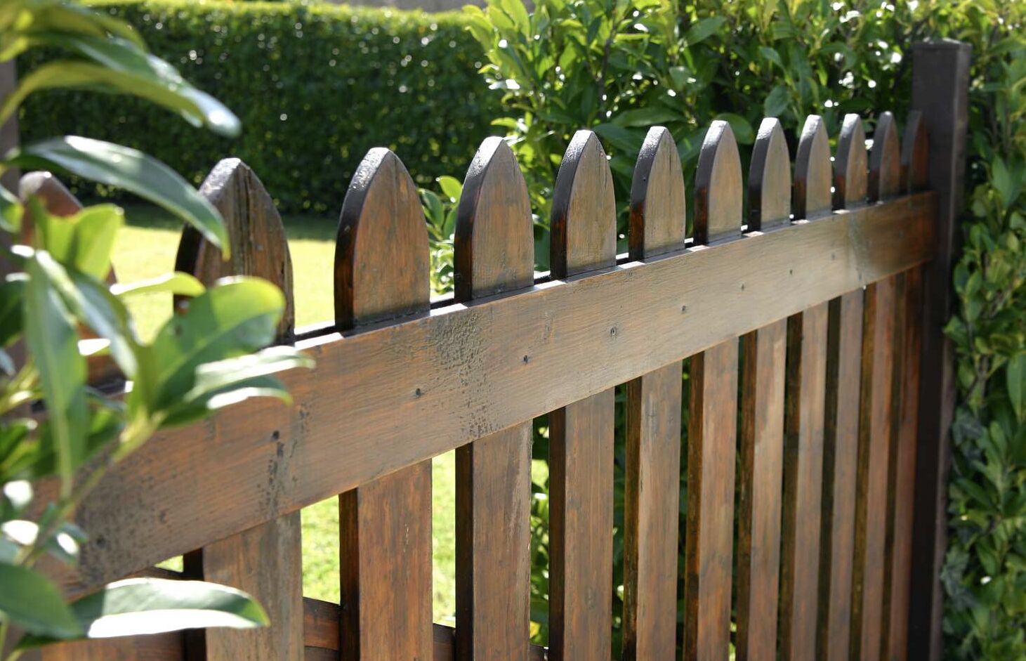 Custom wood picket fence installation for residential property in Kingsport